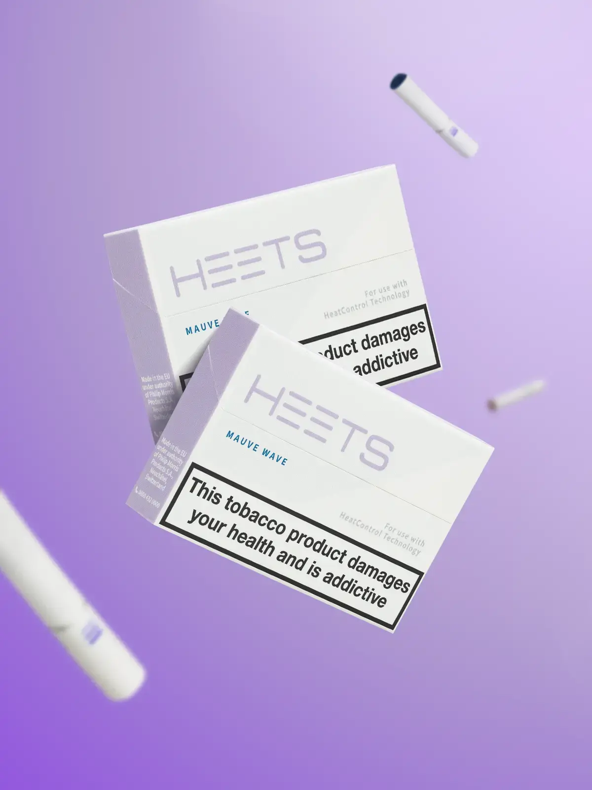 Two packs of IQOS Mauve Wave flavoured HEETS floating in front of a light purple background